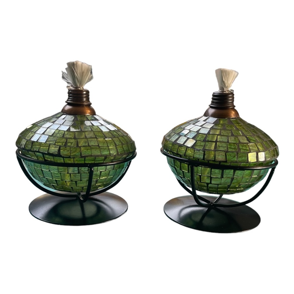 Tabletop torches covered in green crystals